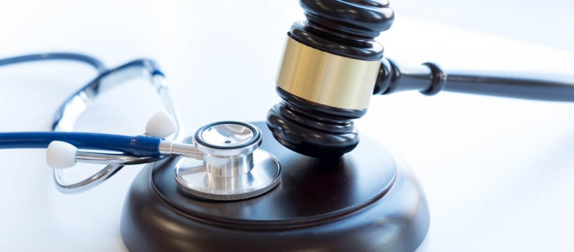 89759310 - gavel and stethoscope. medical jurisprudence. legal definition of medical malpractice. attorney. common errors doctors, nurses and hospitals make.